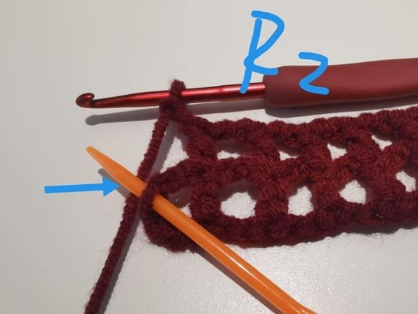 the hook insert the third front loop for round 2 for bow crochet