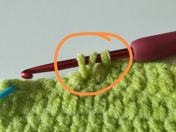three loops on the hook for double crochet