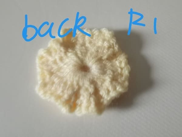 view of back for round 1 for crochet butterfly pattern