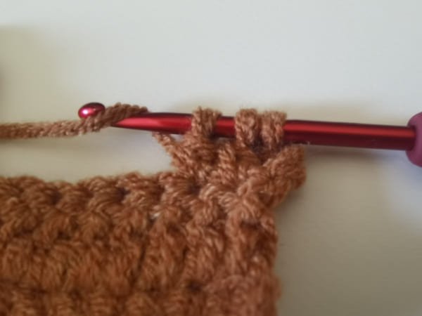 yarn over the last one for double crochet decrease