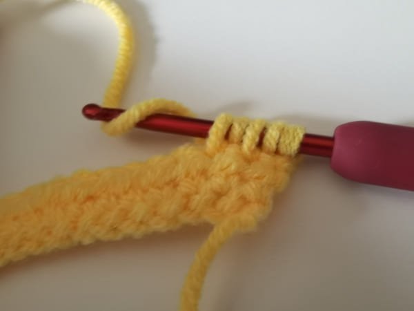 yarn over the last one for half crochet decrease