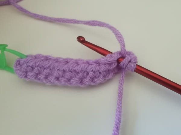 Insert your hook into the target stitch