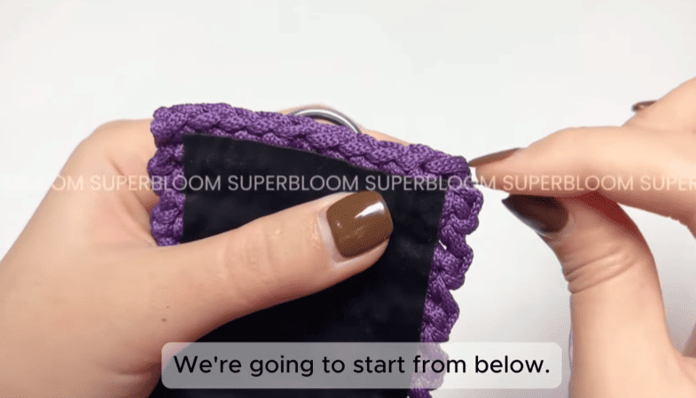 sew black felt fabric sheets for crochet camera bag