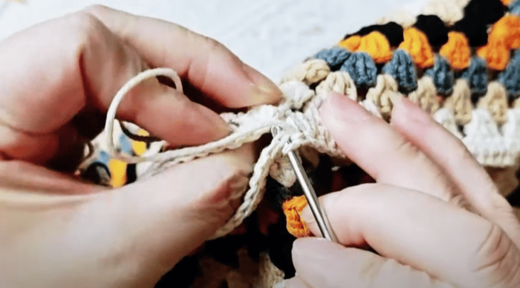 sew bottom with body for crochet bag granny square